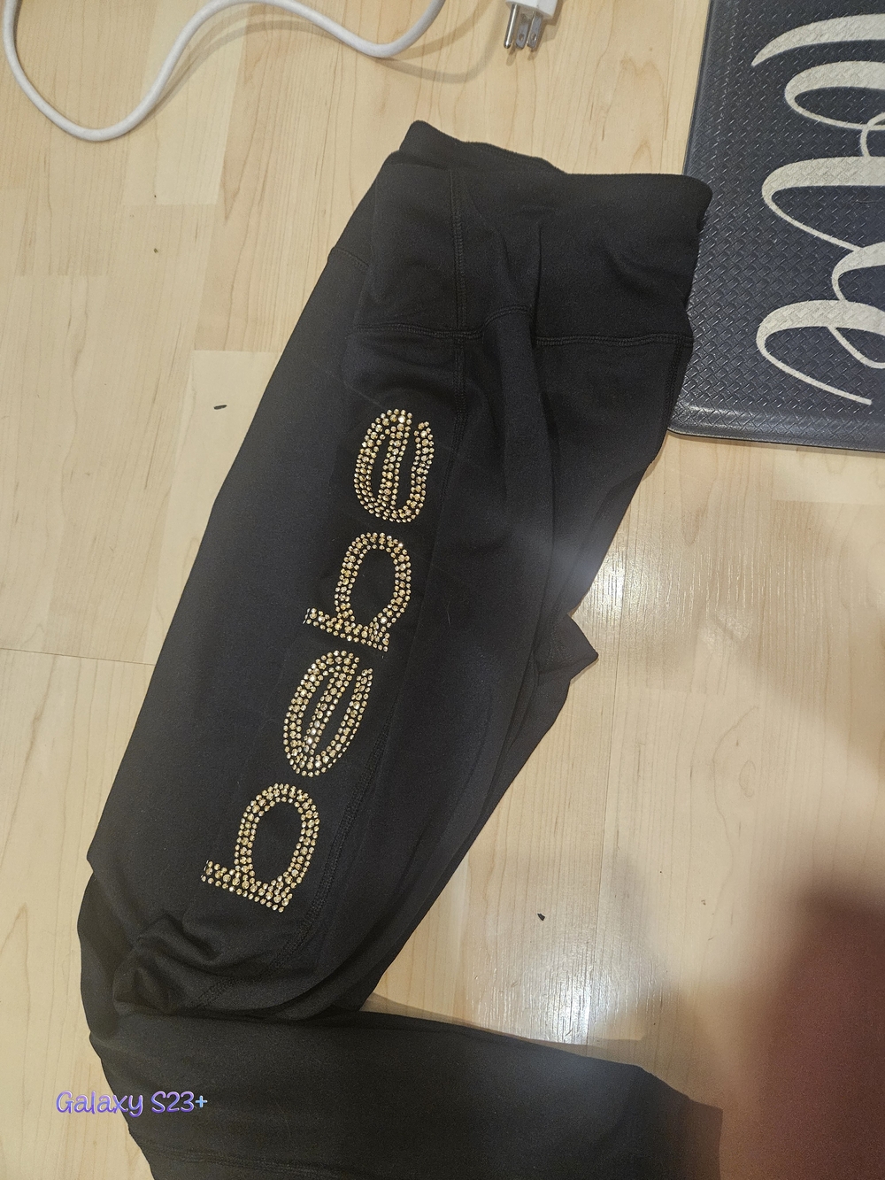 bebe Black Leggings with Gold Stud Logo Down Leg